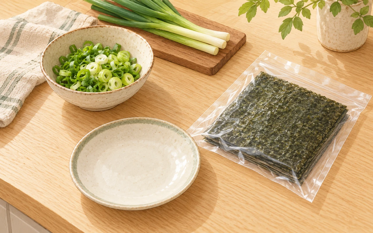 海苔の袋と薬味のねぎ、器を調理台に用意した場面のイラスト